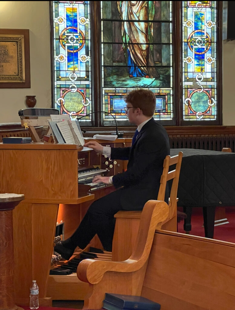 Linden Foster playing the Piano